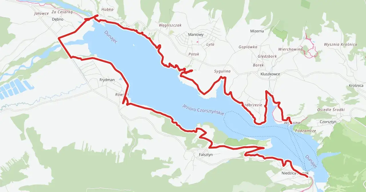 Mapa z zaznaczoną trasą rowerową wokół Jeziora Czorsztyńskiego, prowadzącą przez malownicze tereny.